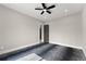 Comfortable bedroom featuring a ceiling fan and neutral décor at 1688 Mineral Springs Rd, Hoschton, GA 30548