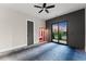 Bonus room featuring a sauna, sliding glass doors, and textured gray walls at 1688 Mineral Springs Rd, Hoschton, GA 30548