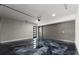 Spacious garage with epoxy flooring and modern door at 1688 Mineral Springs Rd, Hoschton, GA 30548