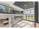 Open floor plan in living room with a loft and large windows for natural light at 1688 Mineral Springs Rd, Hoschton, GA 30548