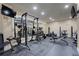On site fitness center with multiple weight racks and various exercise equipment at 1850 Cotillion Dr # 2221, Atlanta, GA 30338