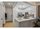 Bright kitchen with white cabinetry, stainless steel appliances, and sleek quartz countertops at 1850 Cotillion Dr # 2221, Atlanta, GA 30338