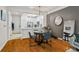 Bright living space featuring a dining area with modern lighting and wood floors at 1850 Cotillion Dr # 2221, Atlanta, GA 30338
