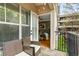 Private patio overlooking lush greenery and the building's exterior features at 1850 Cotillion Dr # 2221, Atlanta, GA 30338