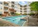 Swimming pool with sun loungers offering a relaxing outdoor retreat at 1850 Cotillion Dr # 2221, Atlanta, GA 30338