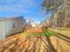 Large backyard featuring a big deck, new sod, and a wooded border at 3113 Shiloh Pl, Canton, GA 30115
