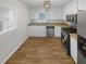 A kitchen featuring white cabinets, stainless steel appliances, and granite countertops at 3113 Shiloh Pl, Canton, GA 30115
