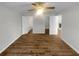A spacious main bedroom with an ensuite bathroom and wood-look floors at 3113 Shiloh Pl, Canton, GA 30115