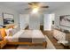 A spacious main bedroom with an ensuite bathroom and wood-look floors at 3113 Shiloh Pl, Canton, GA 30115