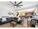 Inviting living room seamlessly connects to the kitchen, creating an open and airy atmosphere perfect for entertaining at 103 Cottage Way, Euharlee, GA 30145