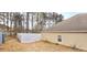 Spacious backyard featuring a white vinyl fence for added privacy and definition at 113 Citadel Dr, Hampton, GA 30228