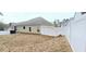 Large backyard with a privacy fence enhances the property's appeal at 113 Citadel Dr, Hampton, GA 30228