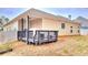 Home boasts a deck perfect for outdoor entertaining and relaxing at 113 Citadel Dr, Hampton, GA 30228