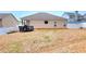 The house has a large yard, a deck, and a privacy fence at 113 Citadel Dr, Hampton, GA 30228