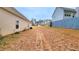 Expansive backyard with potential for landscaping or outdoor activities at 113 Citadel Dr, Hampton, GA 30228