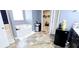 Inviting bathroom featuring a soaking tub, walk-in shower and tile floor at 113 Citadel Dr, Hampton, GA 30228