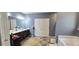 A spacious bathroom is designed with double sinks, a vanity, a bath tub, and a storage cabinet at 113 Citadel Dr, Hampton, GA 30228