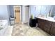 Bathroom featuring dual sinks and a walk-in closet at 113 Citadel Dr, Hampton, GA 30228