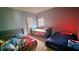 Bedroom with three beds and neutral-toned walls at 113 Citadel Dr, Hampton, GA 30228