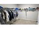 Walk-in closet with custom shelving and ample storage space at 113 Citadel Dr, Hampton, GA 30228