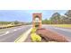 A brick entrance to Liberty Square Park at Historic Hampton at 113 Citadel Dr, Hampton, GA 30228