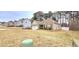 The house has a well-maintained lawn and a driveway leading to a two-car garage at 113 Citadel Dr, Hampton, GA 30228