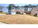 Lovely home with a two-car garage and well-maintained lawn at 113 Citadel Dr, Hampton, GA 30228
