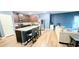 Modern kitchen with a large island, stainless steel appliances, and an open floor plan at 113 Citadel Dr, Hampton, GA 30228