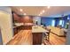 Spacious kitchen with granite countertops, wooden cabinets, and stainless steel refrigerator at 113 Citadel Dr, Hampton, GA 30228