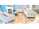 Comfortable living room with stylish furniture, fireplace, and hardwood flooring, perfect for relaxing at 113 Citadel Dr, Hampton, GA 30228