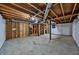 Unfinished basement with exposed ceiling, concrete floor, and utility access at 570 Harris Sw Ct, Marietta, GA 30060
