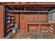 Basement workshop area features shelves, pegboard and workbench at 570 Harris Sw Ct, Marietta, GA 30060