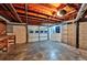 Unfinished basement with wood-beam ceilings and potential for customization at 570 Harris Sw Ct, Marietta, GA 30060
