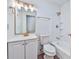 Modern bathroom featuring updated fixtures, including a vanity, toilet, and shower, providing a clean and stylish space at 570 Harris Sw Ct, Marietta, GA 30060