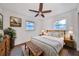 Cozy bedroom featuring warm wood accents, soft lighting, and a comfortable bed, creating a relaxing retreat at 570 Harris Sw Ct, Marietta, GA 30060