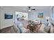 Bright living room featuring hardwood floors, an open dining area, and comfortable contemporary furnishings at 570 Harris Sw Ct, Marietta, GA 30060