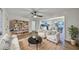 Bright living room with hardwood floors, a bookshelf, and open dining at 570 Harris Sw Ct, Marietta, GA 30060