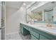 Stylish bathroom showcasing double vanity with modern fixtures and a framed mirror at 6851 Roswell Rd # D-6, Atlanta, GA 30328