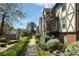 Charming complex showcases classic architecture, manicured landscaping, and inviting walkway at 6851 Roswell Rd # D-6, Atlanta, GA 30328