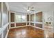 Inviting living room with stylish wood floors and a large window that fills the space with natural light at 6851 Roswell Rd # D-6, Atlanta, GA 30328