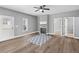 Inviting living room featuring a fireplace, hardwood floors, neutral paint and a ceiling fan at 121 Tricias Way, Temple, GA 30179