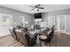 Bright and airy living room with a fireplace and plush leather seating, perfect for entertaining guests at 121 Tricias Way, Temple, GA 30179
