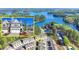 Stunning aerial view of waterfront homes with lake access and lush greenery at 2220 Lanier Harbor Pt, Buford, GA 30518