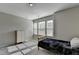 Bright and spacious bedroom with large windows and ample natural light at 2220 Lanier Harbor Pt, Buford, GA 30518