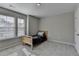 Inviting bedroom with large windows, providing plenty of natural light and a cozy atmosphere at 2220 Lanier Harbor Pt, Buford, GA 30518