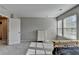 Large bedroom showcasing multiple windows and a closet, perfect for storage at 2220 Lanier Harbor Pt, Buford, GA 30518