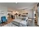 Spacious living area open to kitchen and dining, with comfortable seating and modern design at 2220 Lanier Harbor Pt, Buford, GA 30518