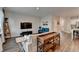 Open living area with stylish furnishings, leading to the kitchen and dining areas at 2220 Lanier Harbor Pt, Buford, GA 30518