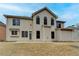 Back of house with a large yard and patio at 2723 Ivy Bluff Ct, Buford, GA 30519