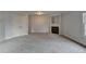 Bedroom boasts carpet, fireplace, and a double door closet for ample storage at 2723 Ivy Bluff Ct, Buford, GA 30519